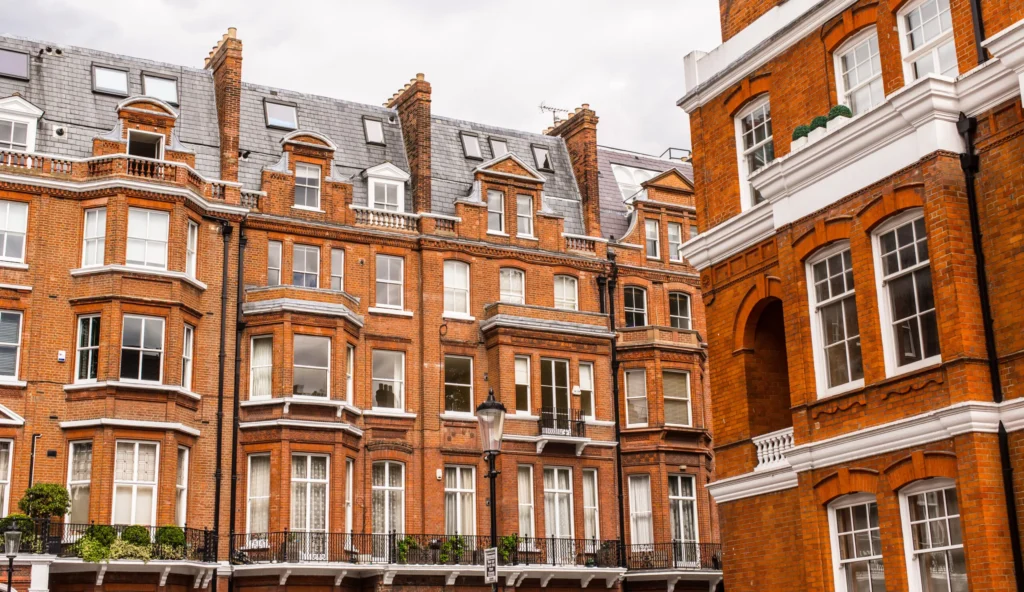 Homeowner weighing options between one or two Party Wall Surveyors Cambridge